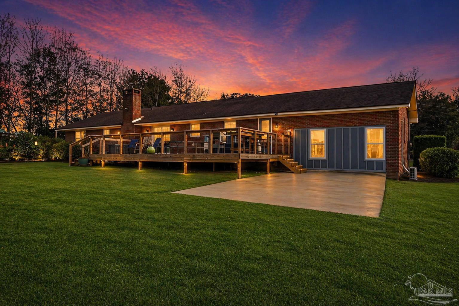 690 Cooley Road Cantonment, FL 32533 - Photo 41 of 64 a view of a house with a big yard