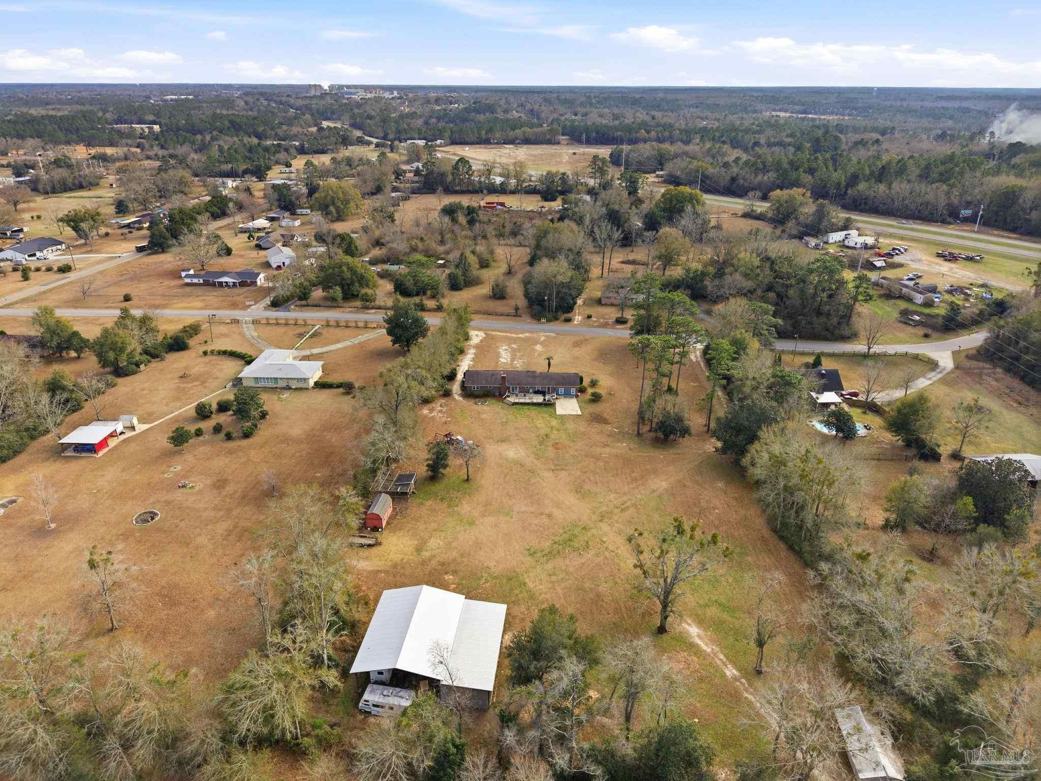 690 Cooley Road Cantonment, FL 32533 - Photo 61 of 64 an aerial view of residential house with parking space