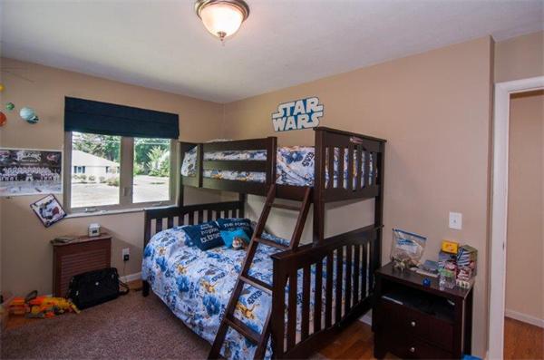 9 Captain Road Longmeadow, MA 01106 - Photo 22 of 28 a bedroom with furniture and a window