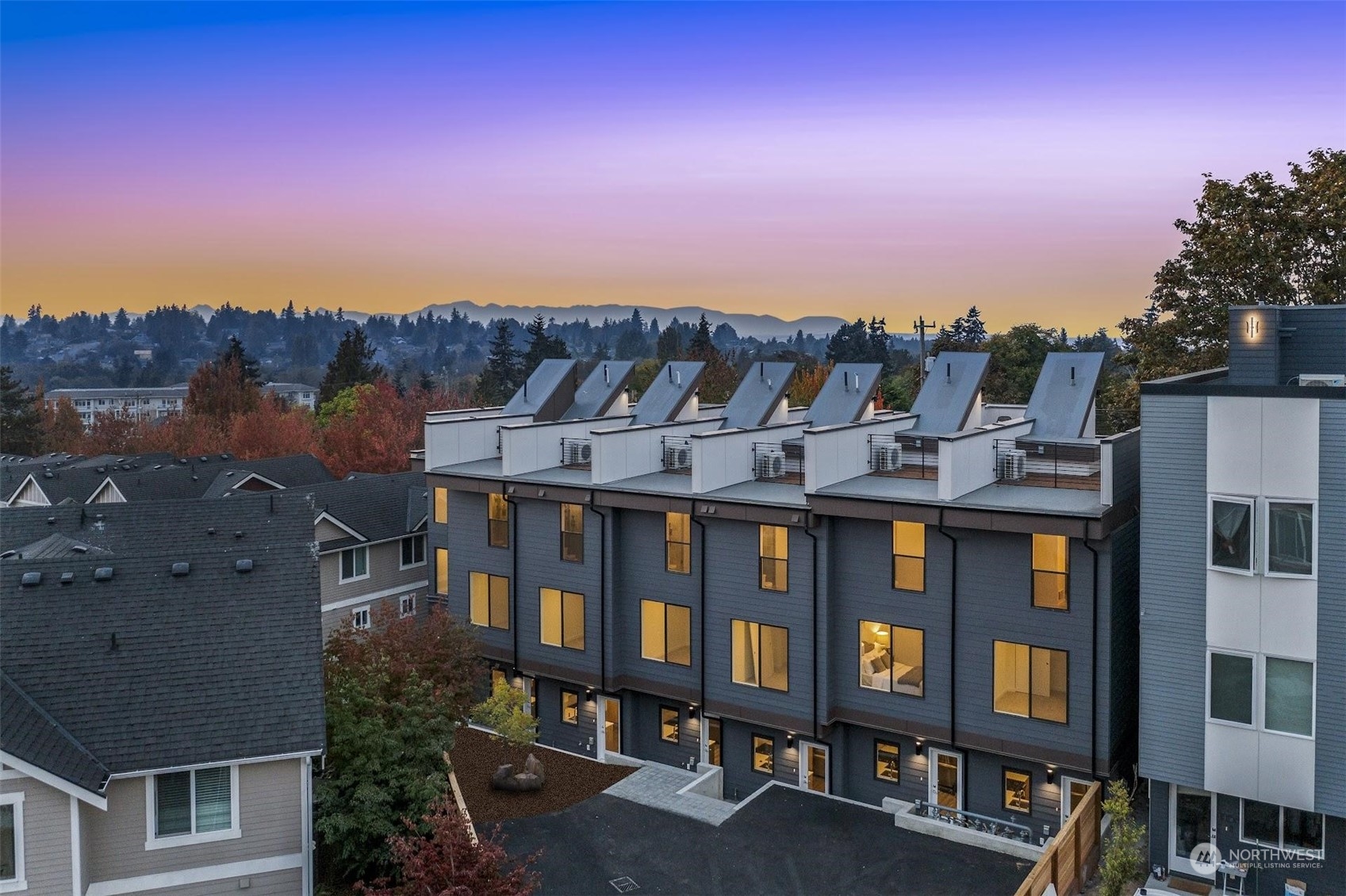 10148 Holman Road Northwest Seattle, WA 98133 - Photo 24 of 38 a view of a large building with a city view