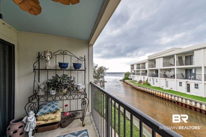 710 South Mobile Street, Unit 52 Fairhope, AL 36532 - Photo 30 of 58 Balcony featuring a water view and a ceiling fan