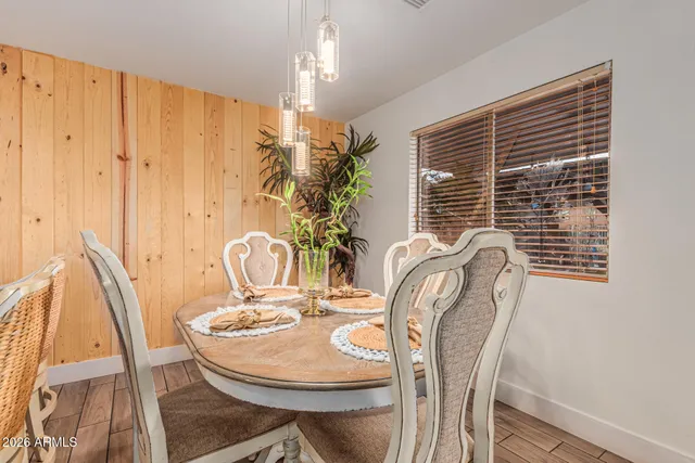 a kitchen with stainless steel appliances granite countertop a refrigerator a stove a sink and a microwave