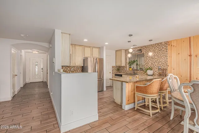 a kitchen with a stove and a sink