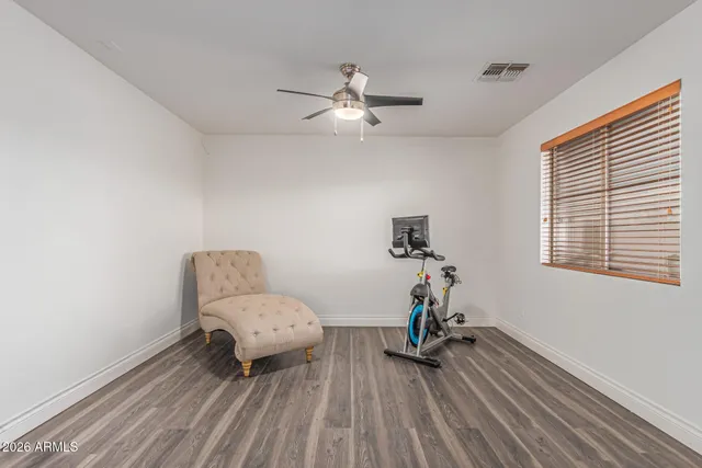 a bathroom with a sink a mirror and a toilet