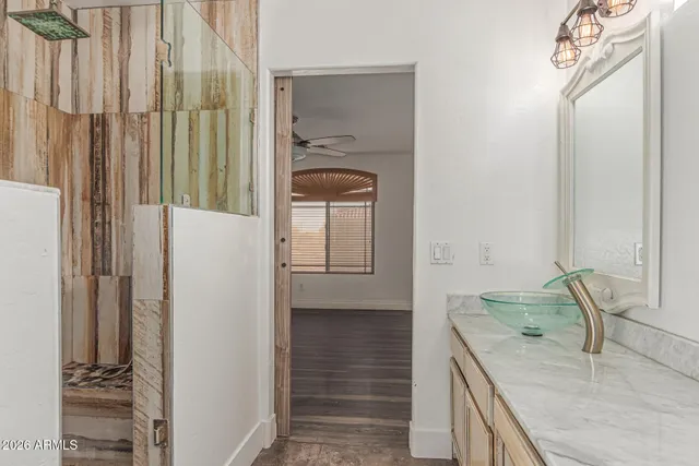 a view of a house with pool and a yard