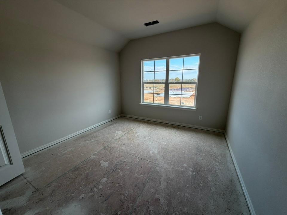 1224 Sabine River Lane Springtown, TX 76082 - Photo 11 of 17 an empty room with a window