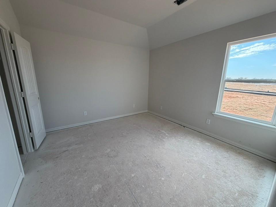 1224 Sabine River Lane Springtown, TX 76082 - Photo 13 of 17 an empty room with a window
