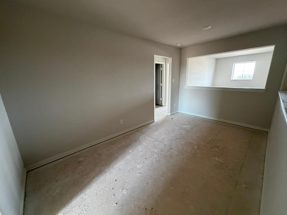 1224 Sabine River Lane Springtown, TX 76082 - Photo 9 of 17 an empty room with windows