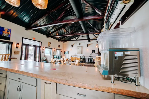 a kitchen that has a lot of cabinets in it