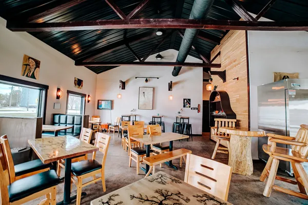 an aerial view of a livingroom with furniture