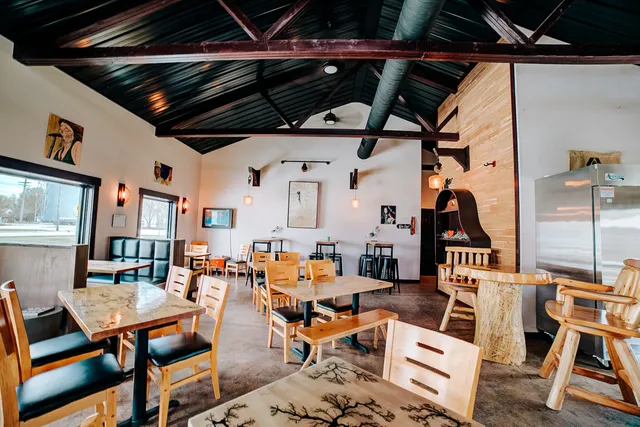 an aerial view of a livingroom with furniture
