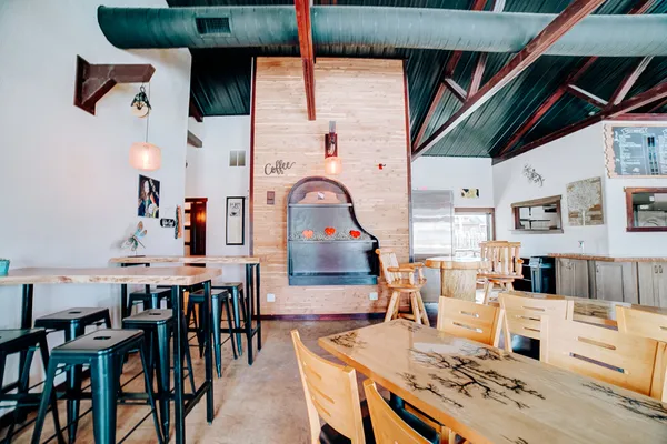 a white toilet sitting next to a bathroom sink