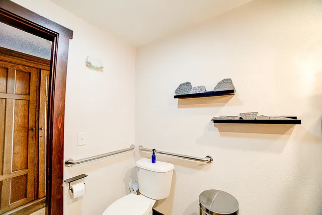 a bedroom with furniture and a window