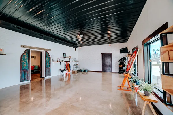 a view of swimming pool with a yard and outdoor seating