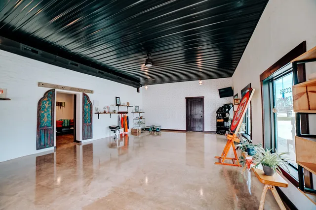 a view of swimming pool with a yard and outdoor seating