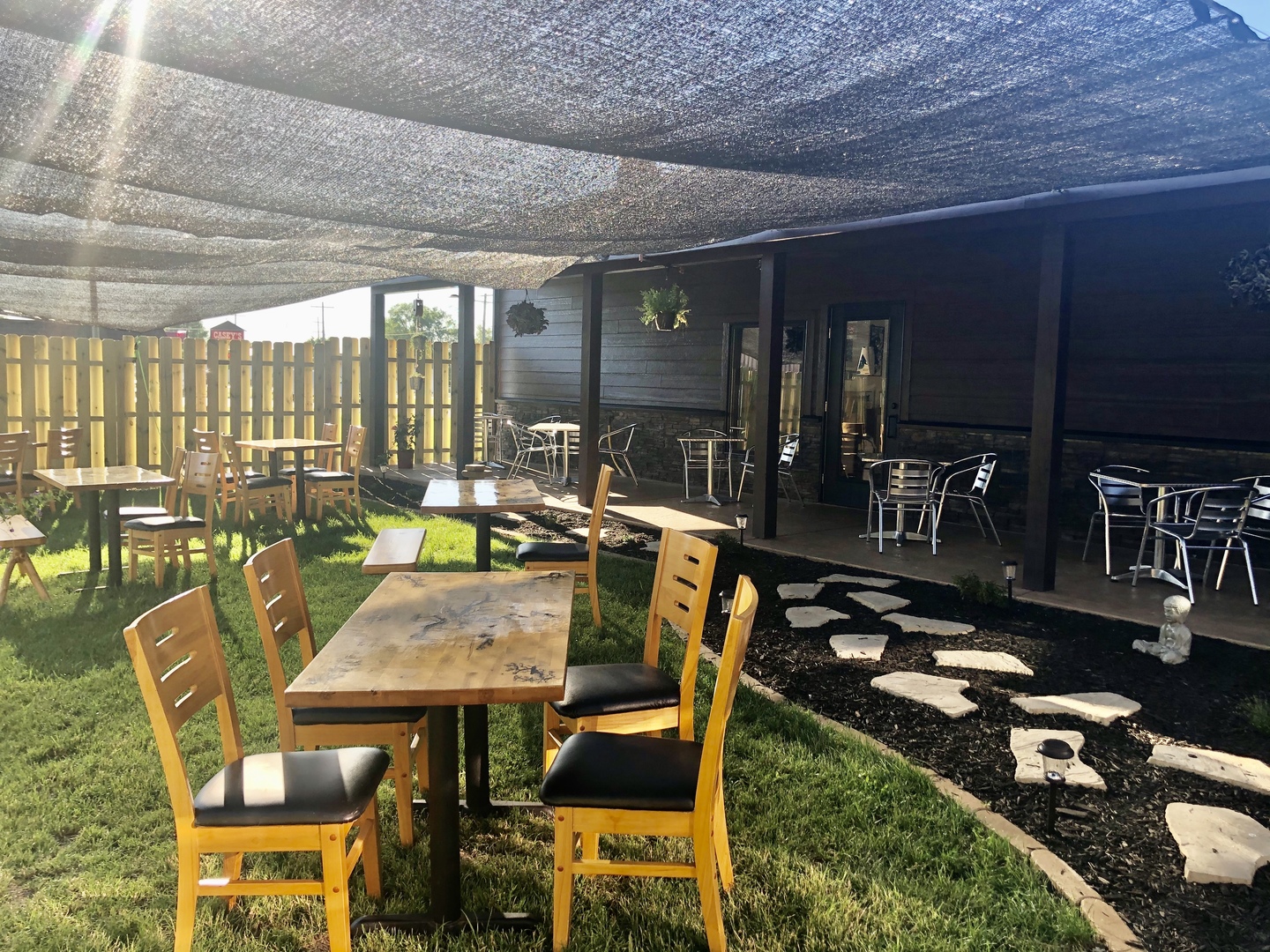 201 Main Street Crescent City, IL 60928 - Photo 56 of 65 a view of a patio with table and chairs with wooden floor