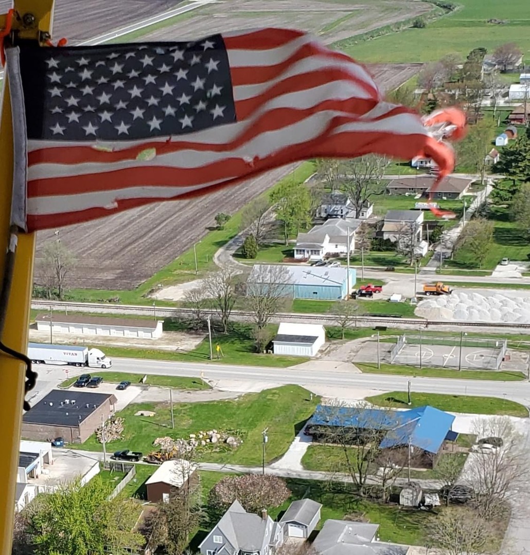 201 Main Street Crescent City, IL 60928 - Photo 60 of 65 a view of swimming pool with a yard and outdoor seating