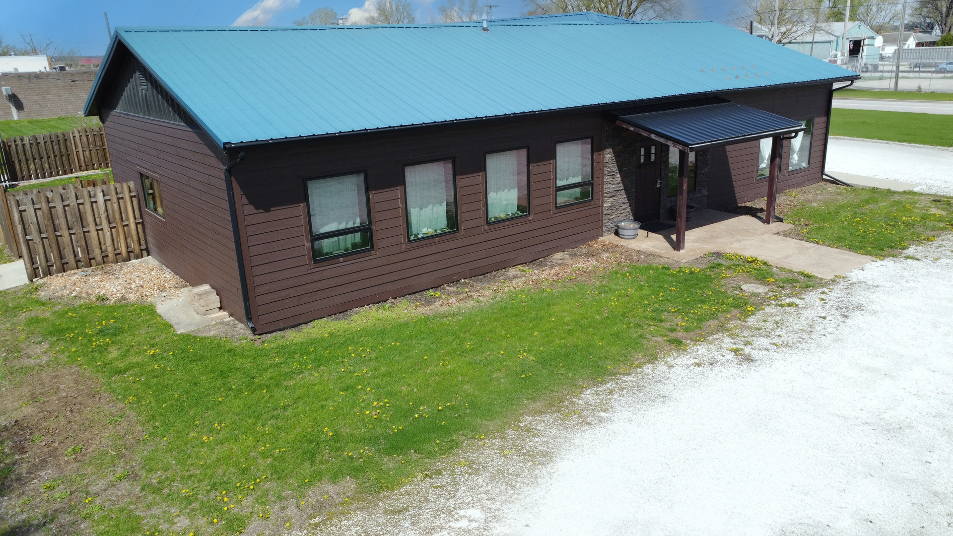 201 Main Street Crescent City, IL 60928 - Photo 8 of 65 a front view of a house with a yard