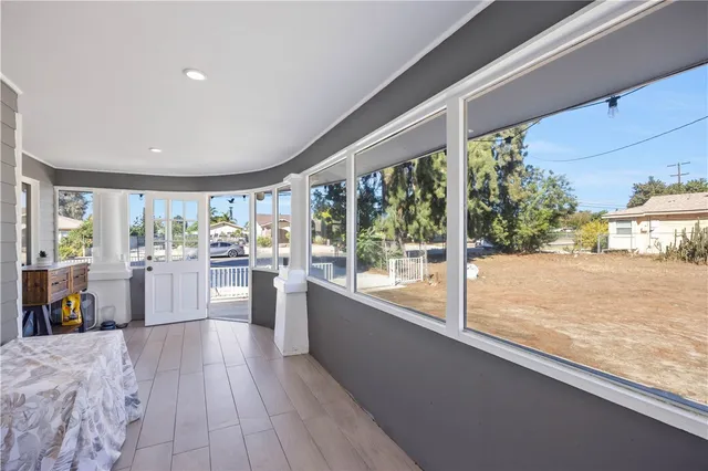 a front view of house with a garden and patio