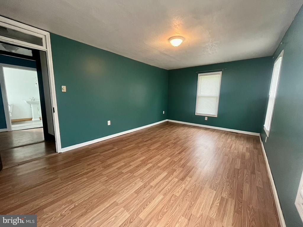 1420 Main Street Port Trevorton, PA 17864 - Photo 15 of 19 a view of empty room with wooden floor