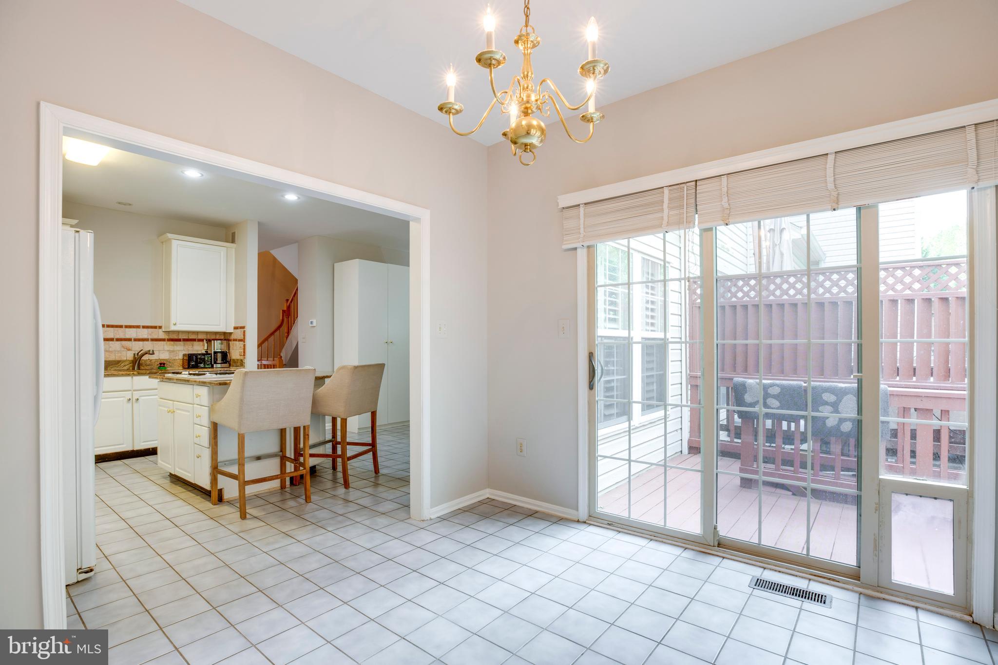5909 Rinard Drive Centreville, VA 20120 - Photo 18 of 46 a view of a dining room with furniture