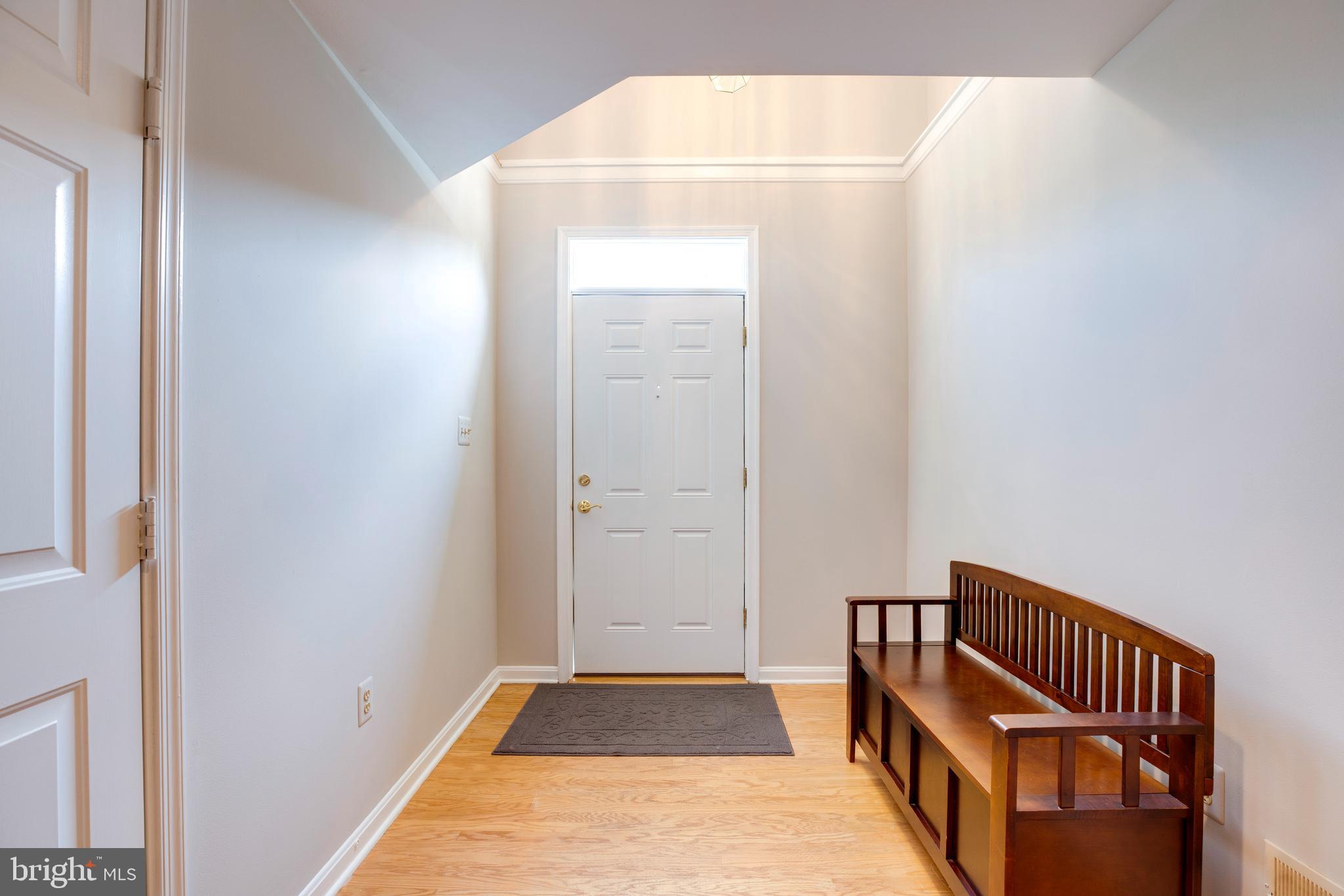 5909 Rinard Drive Centreville, VA 20120 - Photo 2 of 46 a view of a room with wooden floor and a window