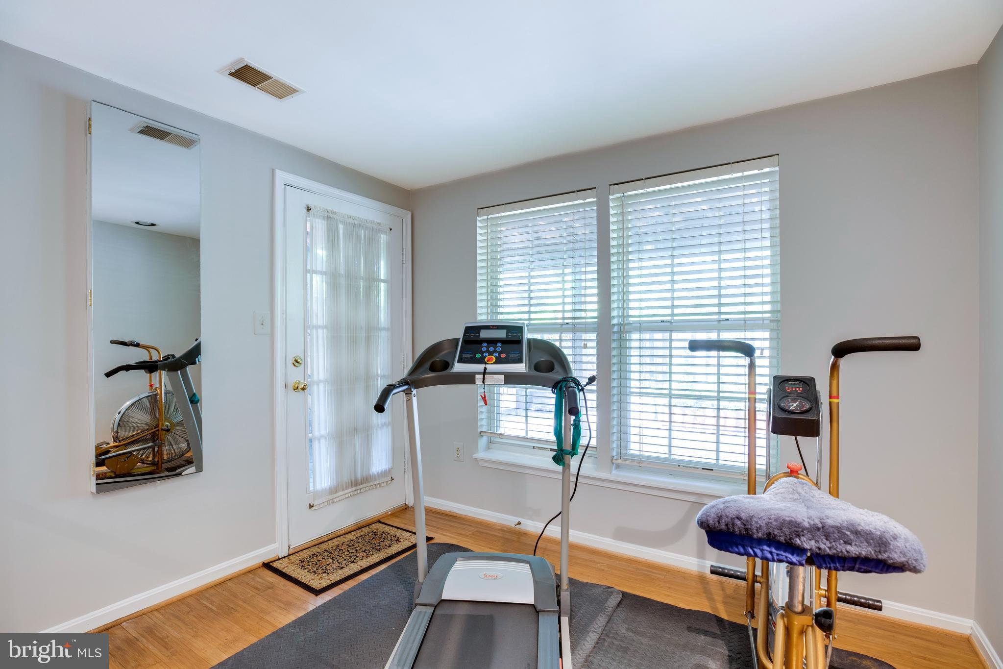 5909 Rinard Drive Centreville, VA 20120 - Photo 25 of 46 a room with furniture and a window