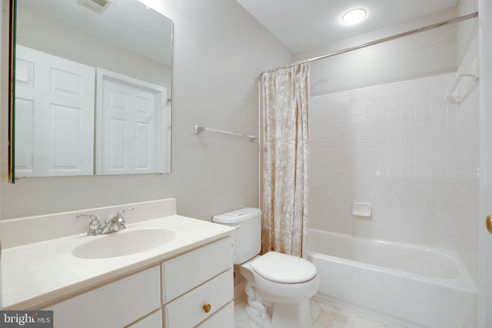 5909 Rinard Drive Centreville, VA 20120 - Photo 36 of 46 a bathroom with a sink toilet and shower