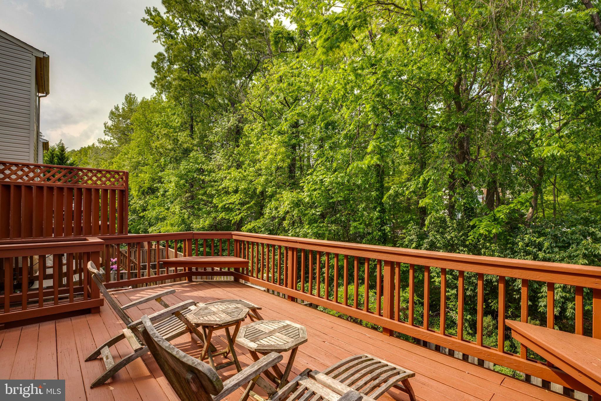 5909 Rinard Drive Centreville, VA 20120 - Photo 44 of 46 a view of a roof deck with wooden floor and fence