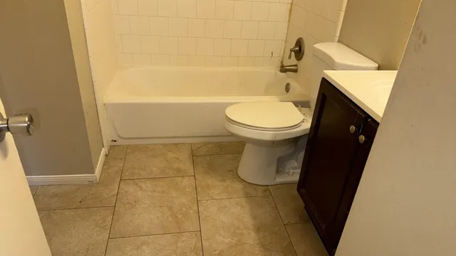 a bathroom with a sink and a toilet