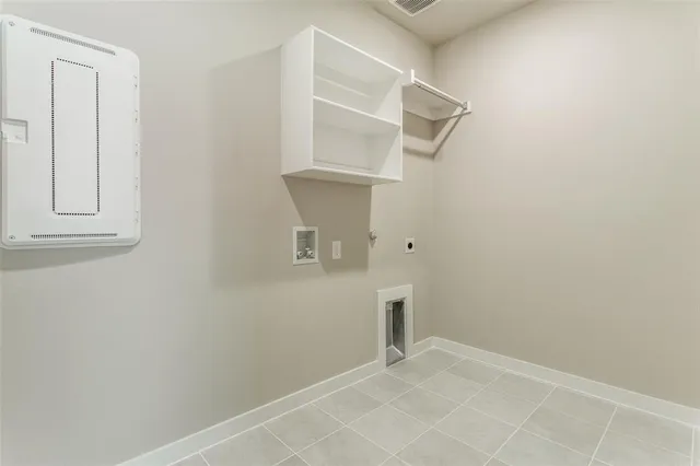 an empty room with shelves