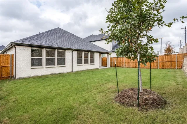 a house view with a garden space