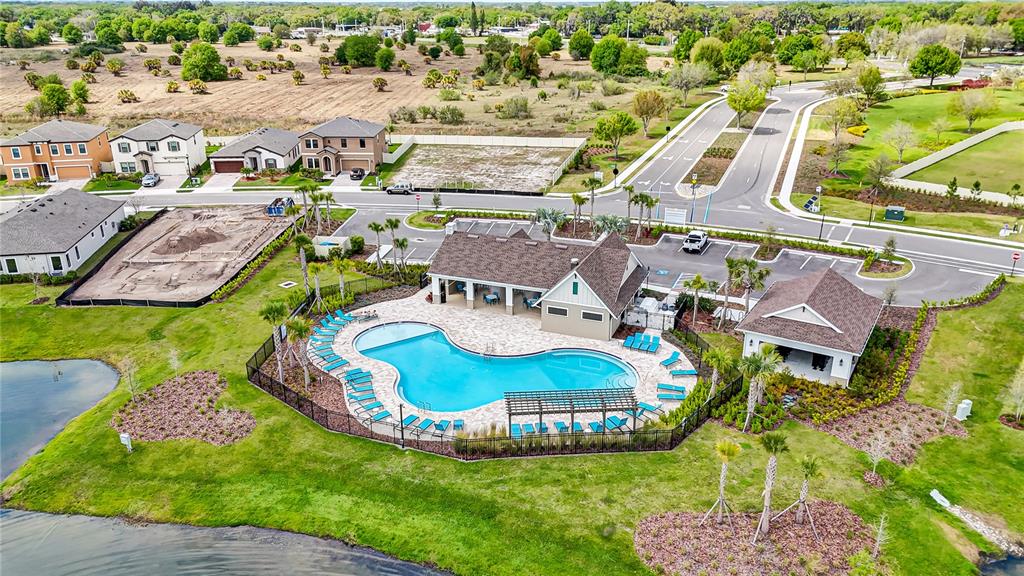 12730 Hysmith Loop Parrish, FL 34219 - Photo 23 of 33 an aerial view of a house with swimming pool and outdoor space