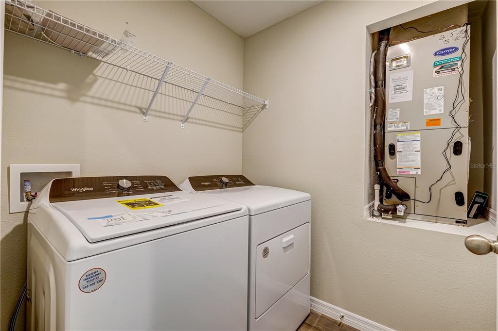 12730 Hysmith Loop Parrish, FL 34219 - Photo 25 of 33 a utility room with dryer and washer