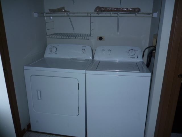 1812 77th Street Naperville, IL 60565 - Photo 13 of 17 a utility room with dryer and washer