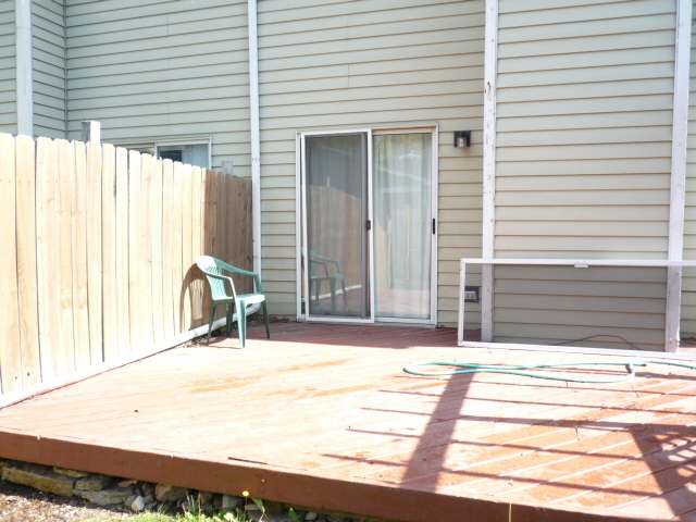 1812 77th Street Naperville, IL 60565 - Photo 15 of 17 a view of a house with a patio