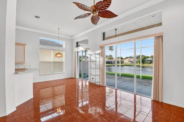 a bathroom with a sink toilet a mirror and shower