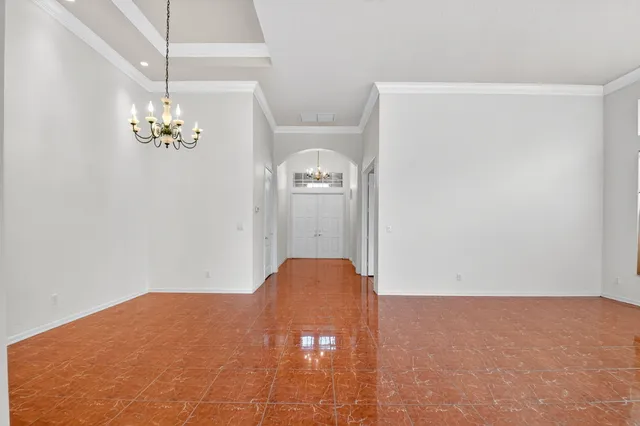 a view of a lake with houses in the back