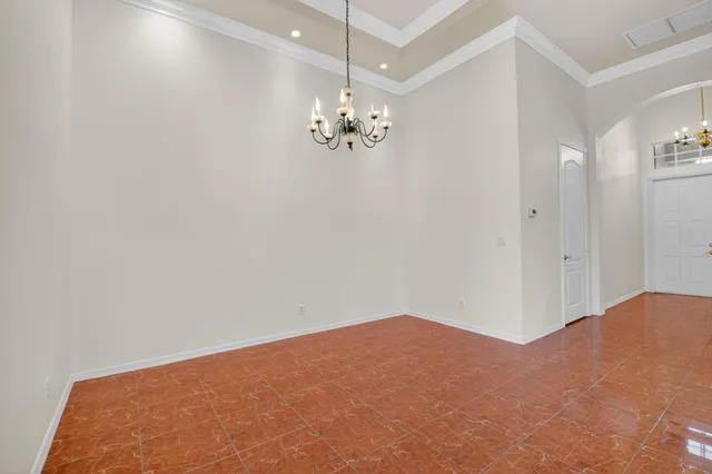 a view of a lake with houses in the back