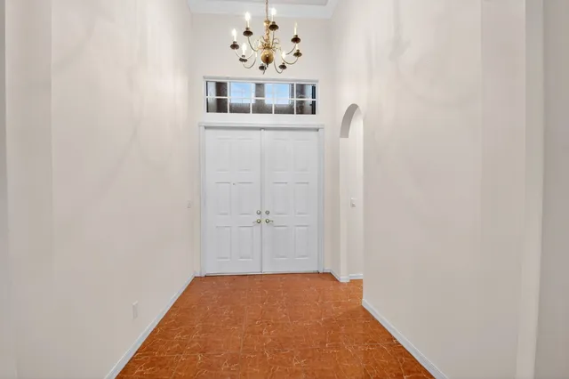 a kitchen with stainless steel appliances a refrigerator sink and cabinets