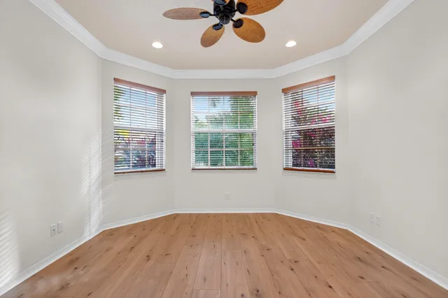 a living room with furniture a window and a dining table