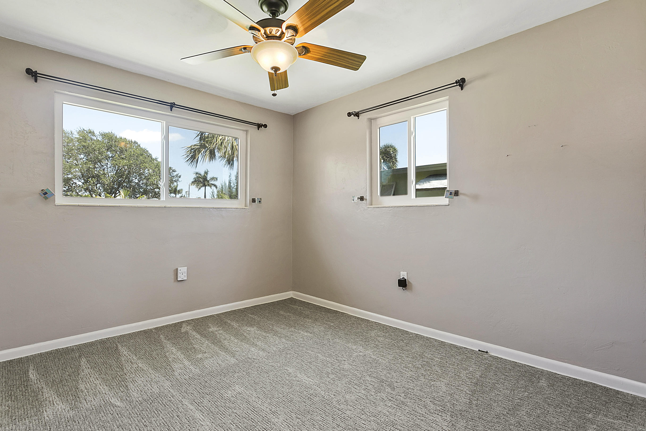 353 Shady Lane Road Palm Springs, FL 33461 - Photo 22 of 30 a view of empty room with window