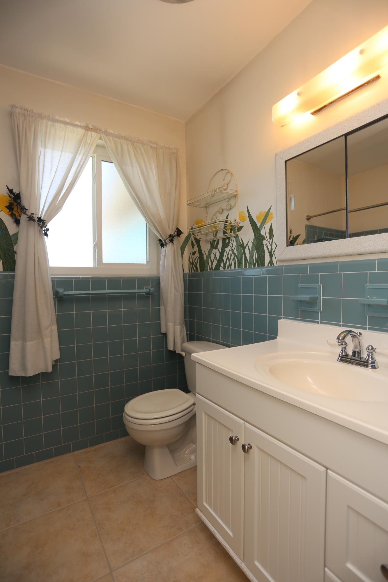 353 Shady Lane Road Palm Springs, FL 33461 - Photo 29 of 30 a bathroom with a sink a toilet and mirror