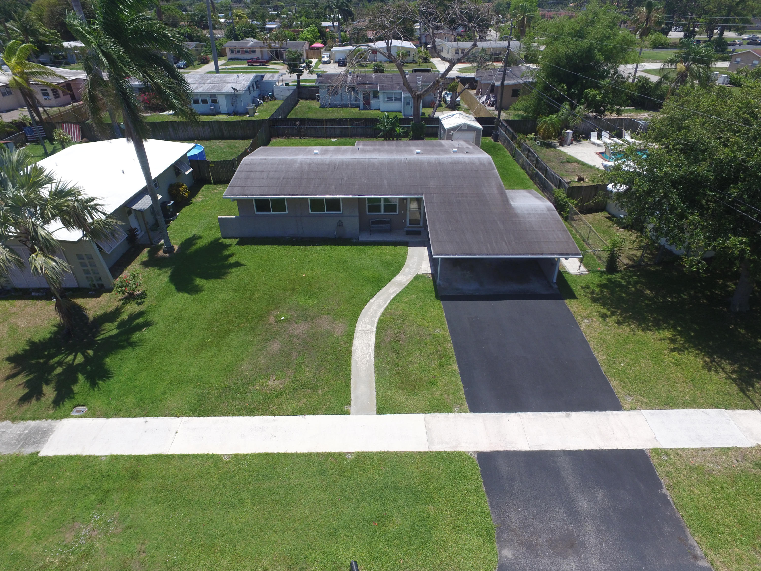 353 Shady Lane Road Palm Springs, FL 33461 - Photo 3 of 30 an aerial view of a house