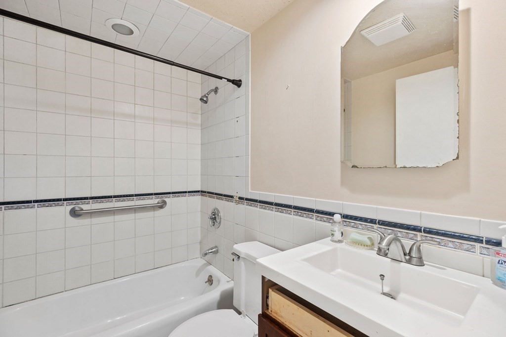 159 Arnold Road Marshfield, MA 02050 - Photo 12 of 22 a bathroom with a sink and a mirror