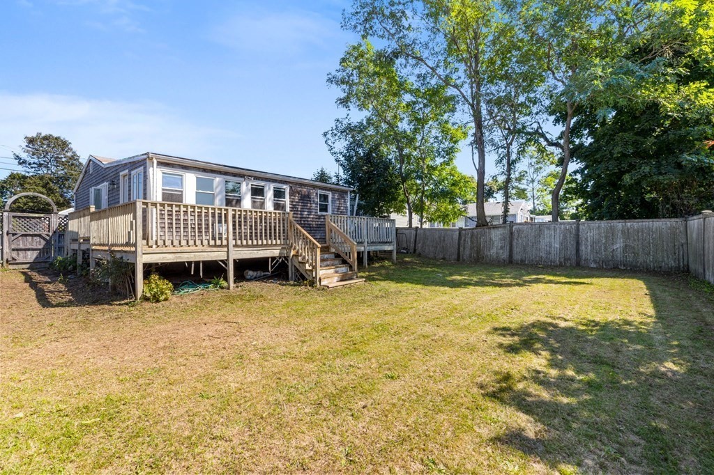 159 Arnold Road Marshfield, MA 02050 - Photo 14 of 22 a front view of a house with a yard balcony