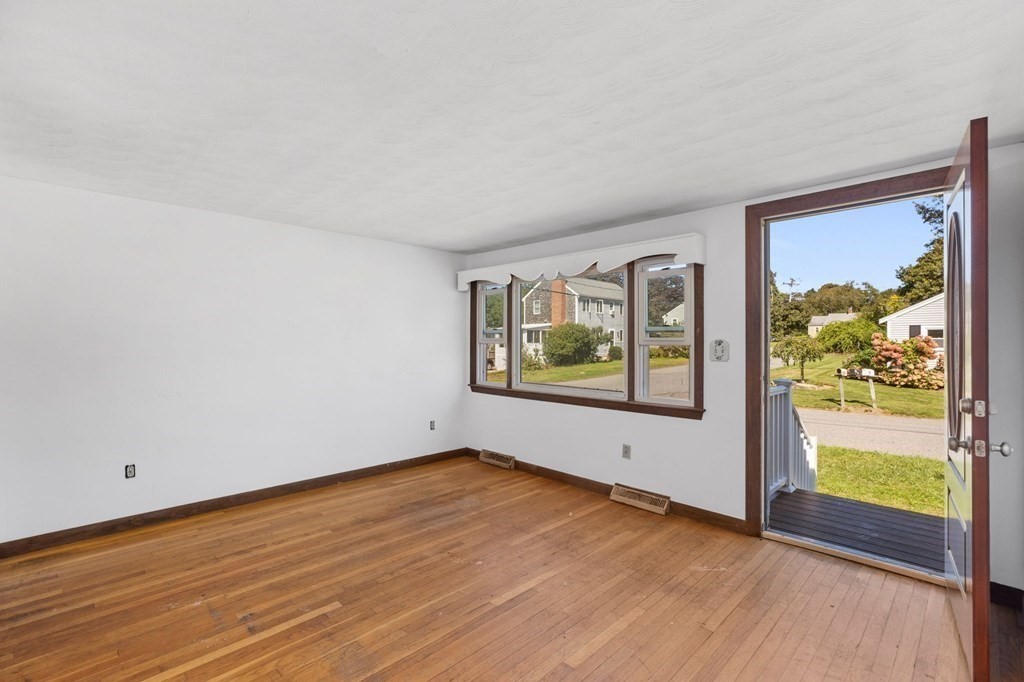 159 Arnold Road Marshfield, MA 02050 - Photo 3 of 22 an empty room with window