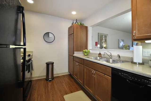 a spacious bathroom with a double vanity sink and a mirror