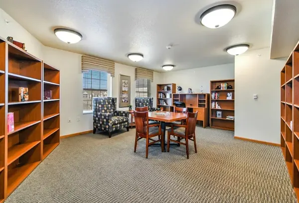 a view of a livingroom with furniture and window