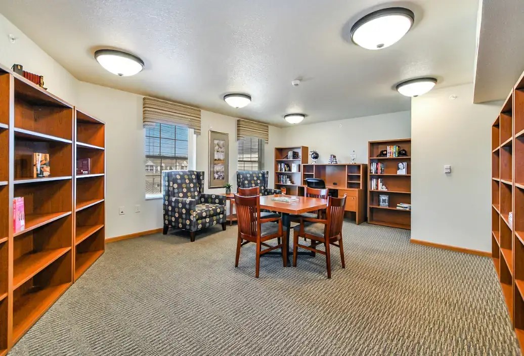 3215 West Mt Hope Avenue Lansing, MI 48911 - Photo 9 of 10 a view of a livingroom with furniture and window